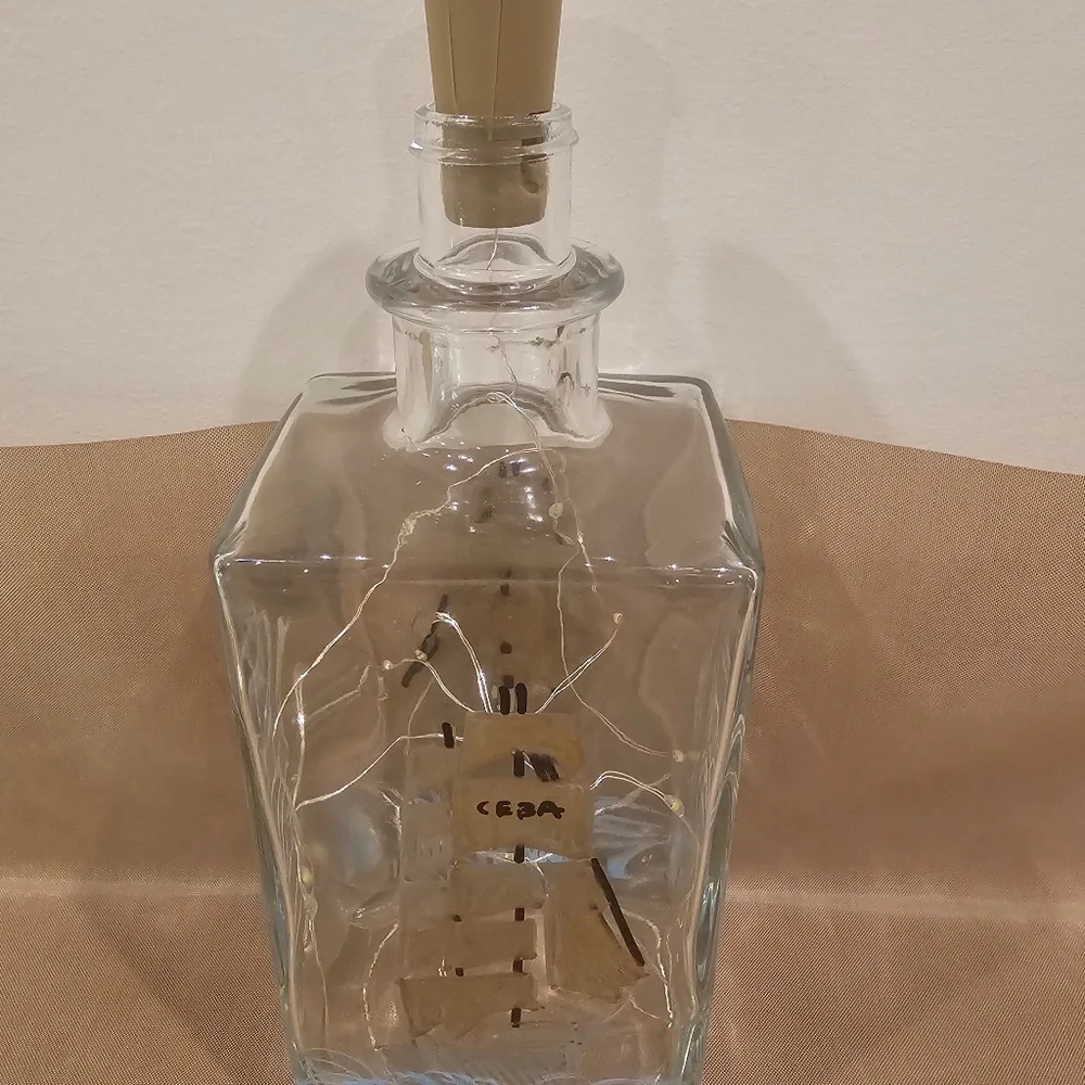 Liquor bottle with cork lights